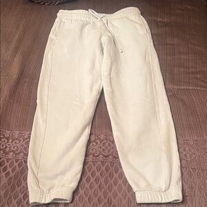 TNA Light Gray Lounge Pants inseam is 26